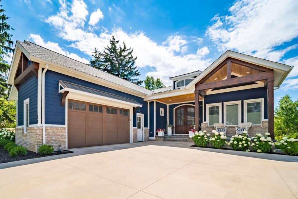Beautiful custom-built house showcasing high-quality construction, durable siding, and elegant archi.
